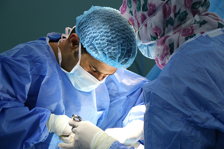 doctor performing surgery