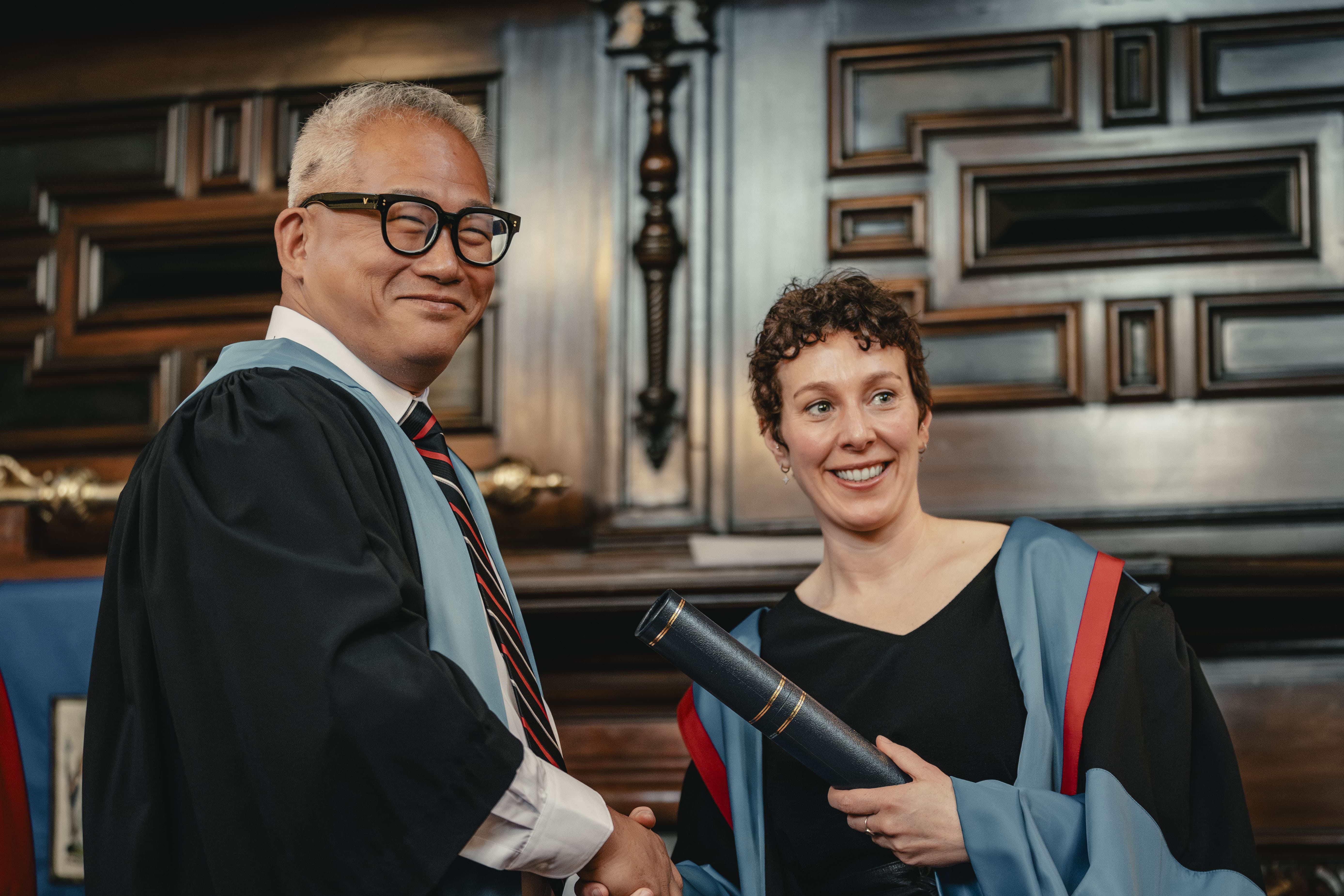 a travel medicine graduate receives their diploma